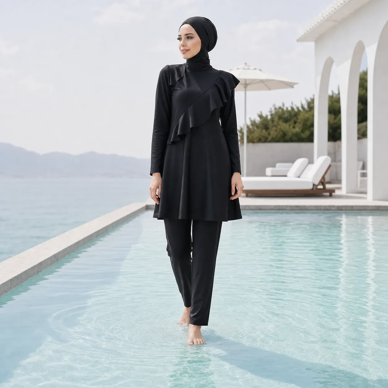 Burkini noir long à volant asymétrique – Signature — porte
